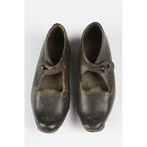 314 - A pair of antique childrens leather shoes.