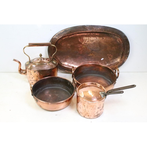 394 - 19th Century Victorian copper kitchenware to include a large kettle, two twin handled pans, lidded s... 