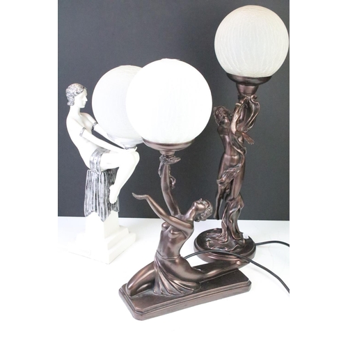 405 - Three Art Deco style table lamps to include two bronzed base examples with female figures, and one w... 