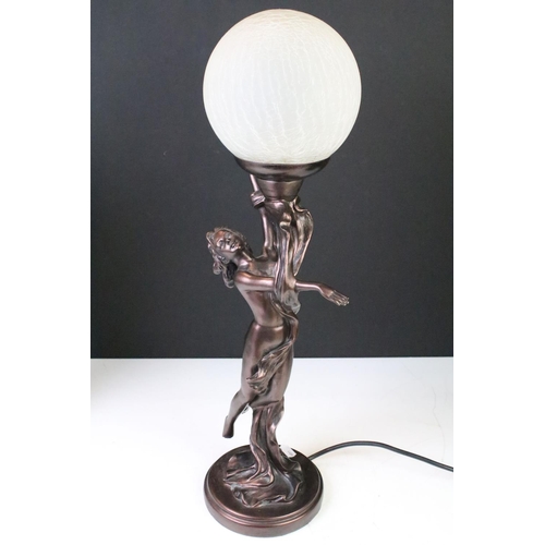 405 - Three Art Deco style table lamps to include two bronzed base examples with female figures, and one w... 