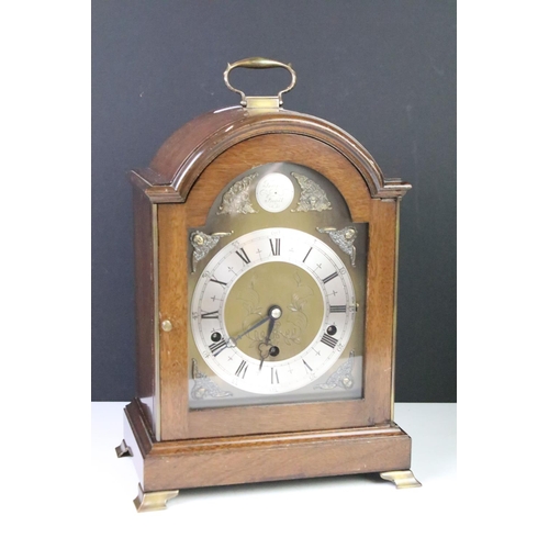 406 - Tempus Fugit bracket clock having an oak case with glazed door to front revealing roman numeral cloc... 