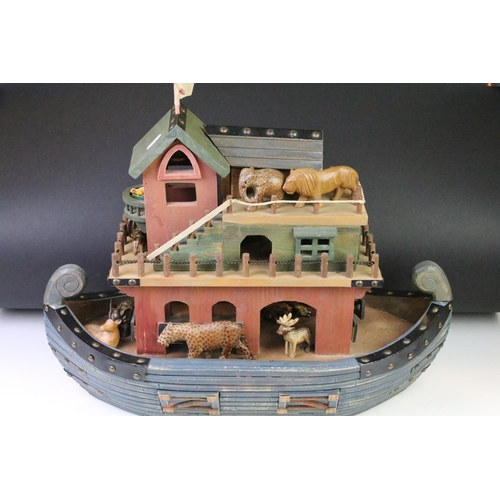 193 - Painted wooden Noah's Ark with carved animals, featuring giraffes, lion, elephants, zebras, etc. Mea... 