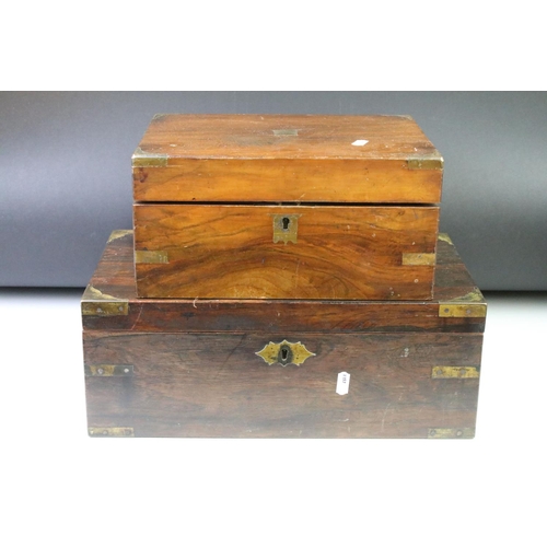 199 - Two Victorian wooden writing boxes, to include a campaign style rosewood example with brass fittings... 