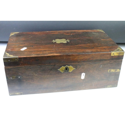 199 - Two Victorian wooden writing boxes, to include a campaign style rosewood example with brass fittings... 