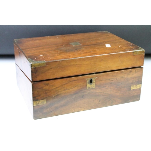 199 - Two Victorian wooden writing boxes, to include a campaign style rosewood example with brass fittings... 