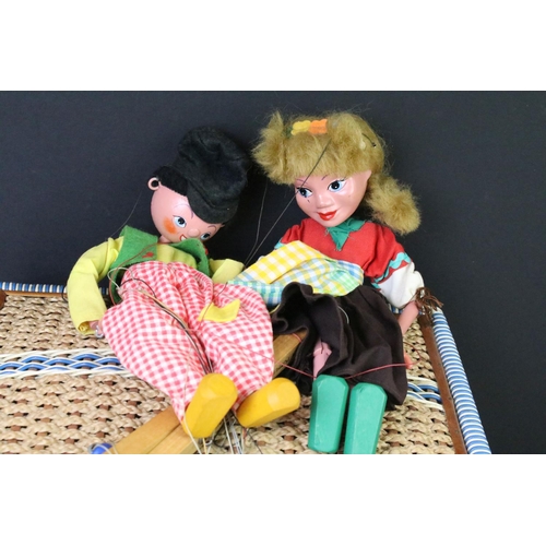 374 - Assorted collectables to include two Pelham puppets, wicker sewing box, vintage record racks, Indian... 