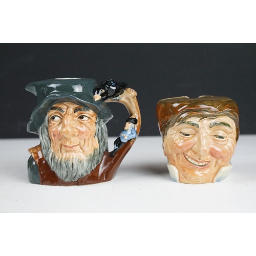 101 - Eight Royal Doulton character jugs and whisky jugs to include Rip Van Winkle (D6463), The Poacher (D... 