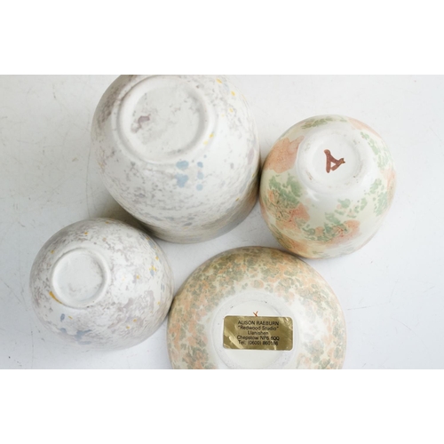 104 - Collection of Alison Raeburn studio art pottery to include a selection of green and pink glazed bowl... 