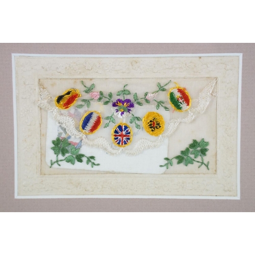 133 - WW1 framed silk postcard presentation, comprising six embroidered silk postcards featuring 'Confianc... 