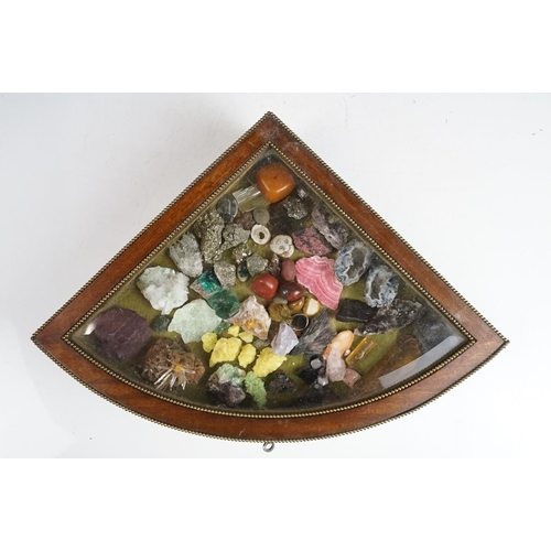 136 - Collection of minerals / crystals featuring Rhodochrocite, Pyrite, geodes, etc, housed within a beve... 