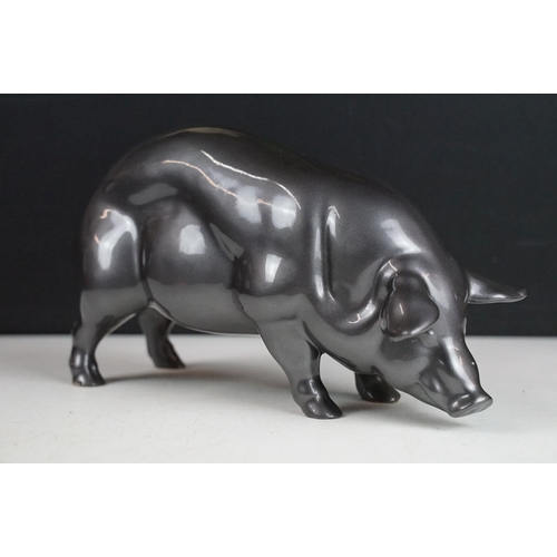 140 - Resin figure of a pig, with metallic pewter effect finish, approx 24cm long