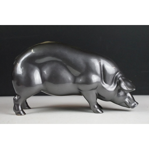 140 - Resin figure of a pig, with metallic pewter effect finish, approx 24cm long