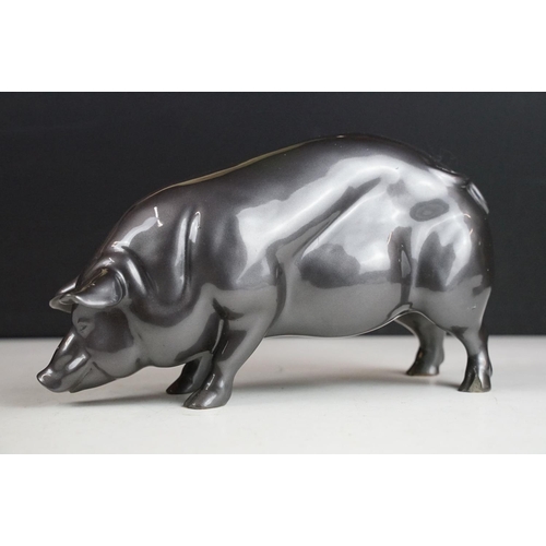 140 - Resin figure of a pig, with metallic pewter effect finish, approx 24cm long