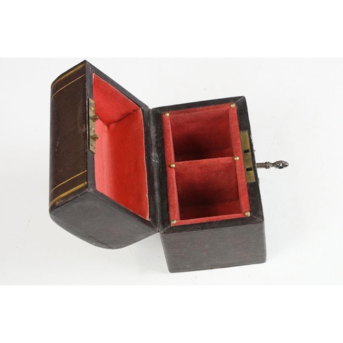 142 - Late 19th / early 20th century scent bottle travelling set, the leather bound case with rounded lid ... 