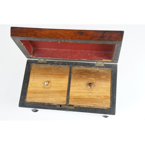 173 - 19th Century oak tea caddy having a domed top, tapering sides and bun feet. the box opens to reveal ... 