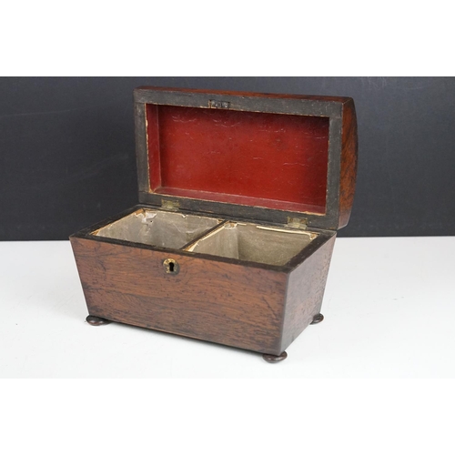 173 - 19th Century oak tea caddy having a domed top, tapering sides and bun feet. the box opens to reveal ... 