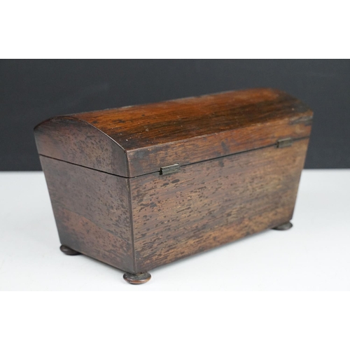 173 - 19th Century oak tea caddy having a domed top, tapering sides and bun feet. the box opens to reveal ... 