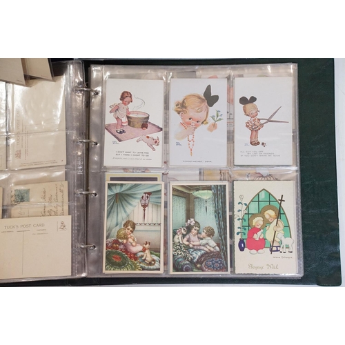 476 - Two albums of early 20th century children related postcards to include Mabel Lucie Attwell, Beatrice... 