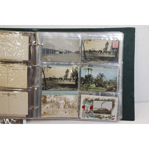 488 - Collection of early 20th century postcards contained within two albums, mostly depicting Queensland,... 