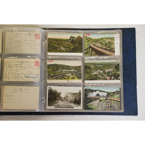 494 - Collection of early 20th century Australian / Australian-style postcards contained within two albums... 