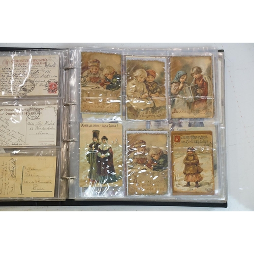 503 - Album of early 20th century Russian / Russian-themed postcards to include black & white and colour e... 