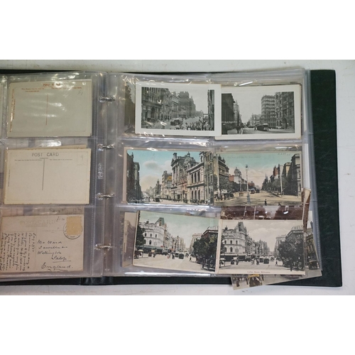 505 - Collection of early 20th century Australian / Australian-themed postcards contained within two album... 