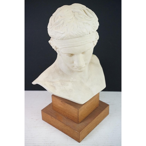 191 - Diadumenos large bust, depicting an Ancient Greek athlete, raised on a two-stepped wooden base, meas... 