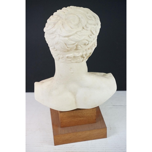 191 - Diadumenos large bust, depicting an Ancient Greek athlete, raised on a two-stepped wooden base, meas... 