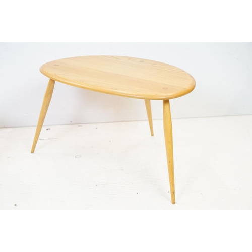 607 - Ercol Pale Elm and Beech Nest of Three Pebble Tables, model 354, 65cm long x 41cm high