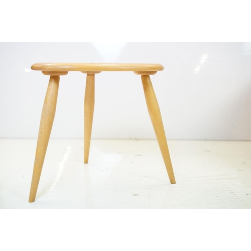 607 - Ercol Pale Elm and Beech Nest of Three Pebble Tables, model 354, 65cm long x 41cm high