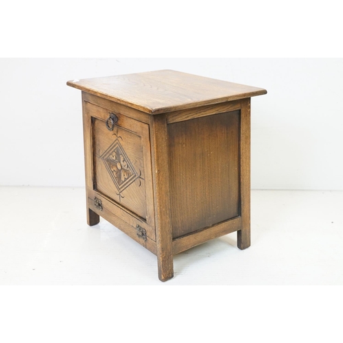 621 - Early 20th century Oak Purdonium with carved drop down front, 54cm high x 51cm wide