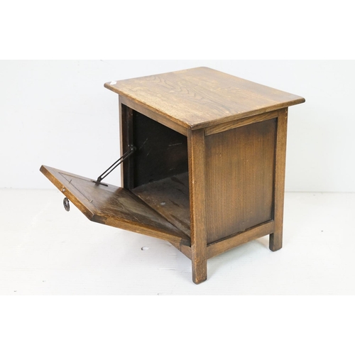 621 - Early 20th century Oak Purdonium with carved drop down front, 54cm high x 51cm wide