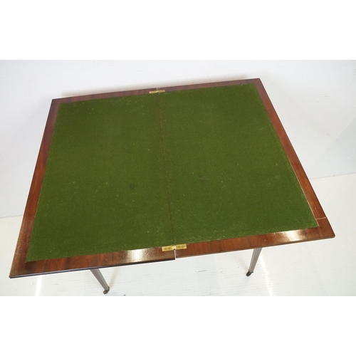 633 - Edwardian Mahogany Inlaid Rectangular Card Table, the fold-over top opening to a green baise playing... 