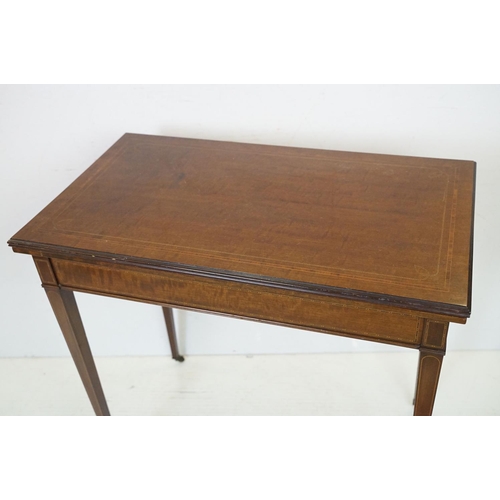 633 - Edwardian Mahogany Inlaid Rectangular Card Table, the fold-over top opening to a green baise playing... 