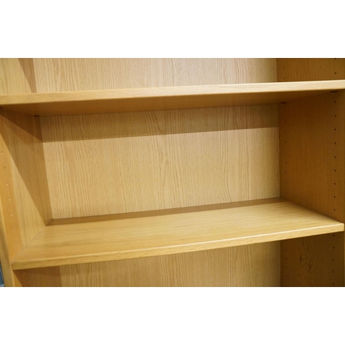 638 - Pair of Danish Dansk Pale Oak Bookcase Cupboards, each with three adjustable shelves over two cupboa... 