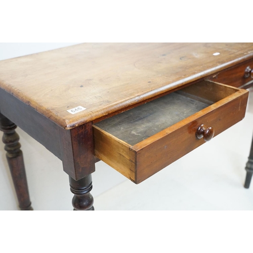 646 - Victorian Mahogany Side Table with two drawers and raised on turned legs, 74cm high x 106cm wide x 5... 