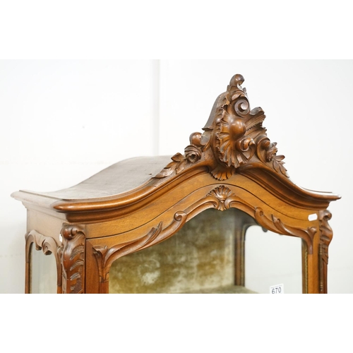 670 - French style Carved Walnut Display Cabinet, the single glazed door opening to a grey velvet lined in... 