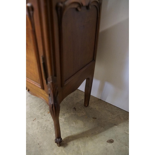 670 - French style Carved Walnut Display Cabinet, the single glazed door opening to a grey velvet lined in... 