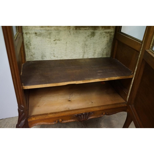 670 - French style Carved Walnut Display Cabinet, the single glazed door opening to a grey velvet lined in... 