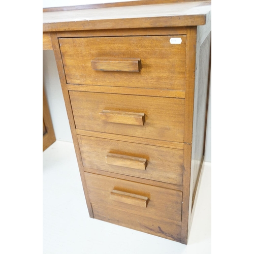 677 - Mid century Teak Long Desk with pedestal of four drawers and a pedestal with stationery compartments... 