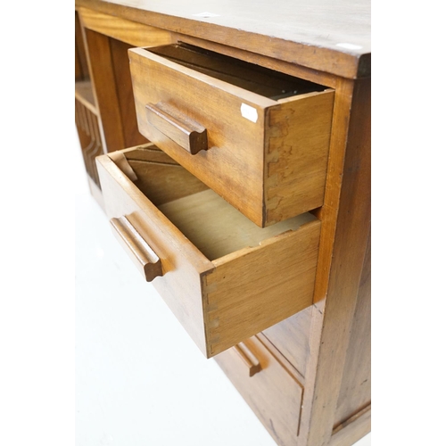 677 - Mid century Teak Long Desk with pedestal of four drawers and a pedestal with stationery compartments... 