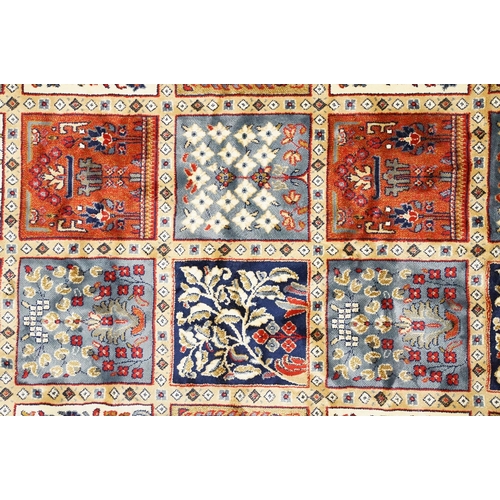 679 - Ivory ground Kashmir Carpet, Persian panel design, 300cm x 200cm