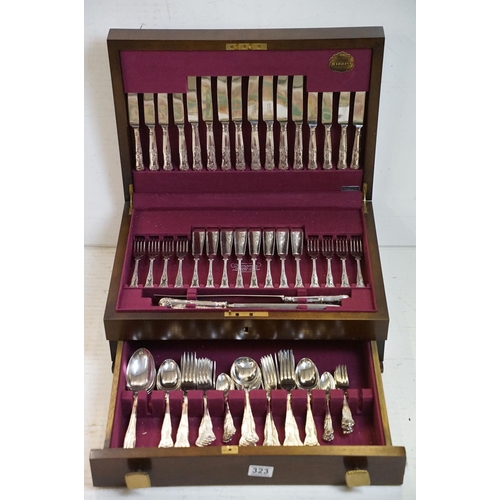 323 - A Warris canteen of silver plated cutlery to include carving set.