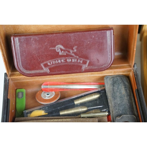 325 - A box of mixed collectables to include a collection of ballpoint and fountain pens, cut throat razor... 