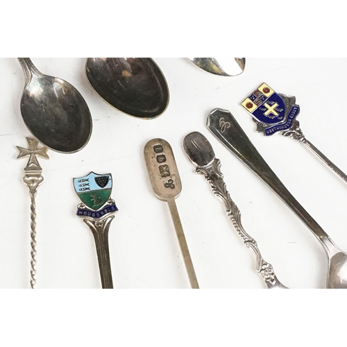 364 - A collection of sterling silver and silver plated souvenir teaspoons.