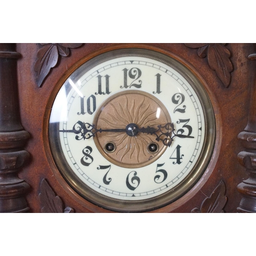 427 - Late 19th / early 20th century Vienna walnut wall clock, the cream dial with Arabic numerals, with E... 