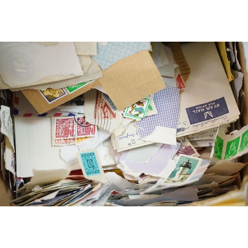 452 - Collection of empty stamp albums, together with a large selection of loose kilo ware world stamps. 2... 