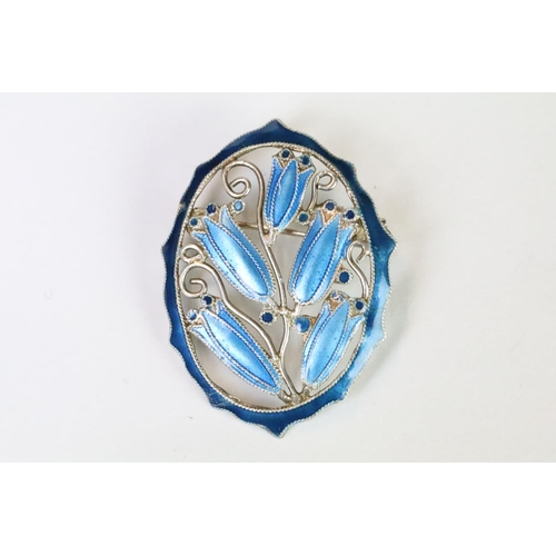 150 - A 925 sterling silver and blue enamel pin brooch in the Art Nouveau style with bell flower decoratio... 