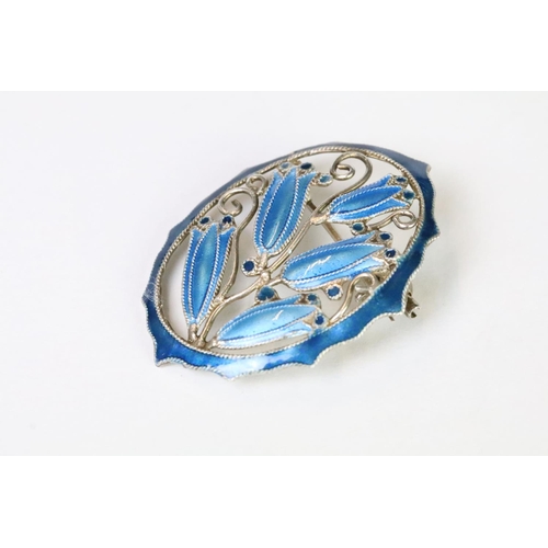 150 - A 925 sterling silver and blue enamel pin brooch in the Art Nouveau style with bell flower decoratio... 