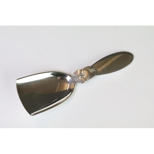 178 - A Georg Jensen sterling silver cactus pattern caddy spoon, marked Georg Jensen, Sterling Denmark to ... 